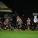 Grimsby Town players celebrate their win over Manchester United.