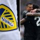 Leeds United logo with Spurs players