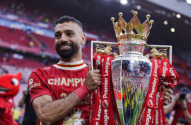 Liverpool's Mohamed Salah with the Premier League trophy.