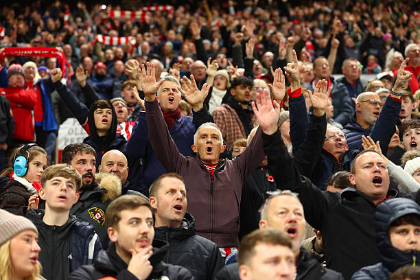 Fans in full voice during a Premier League match.