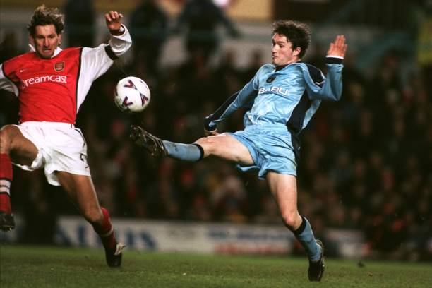 Coventry City's Robbie Keane scores v Arsenal