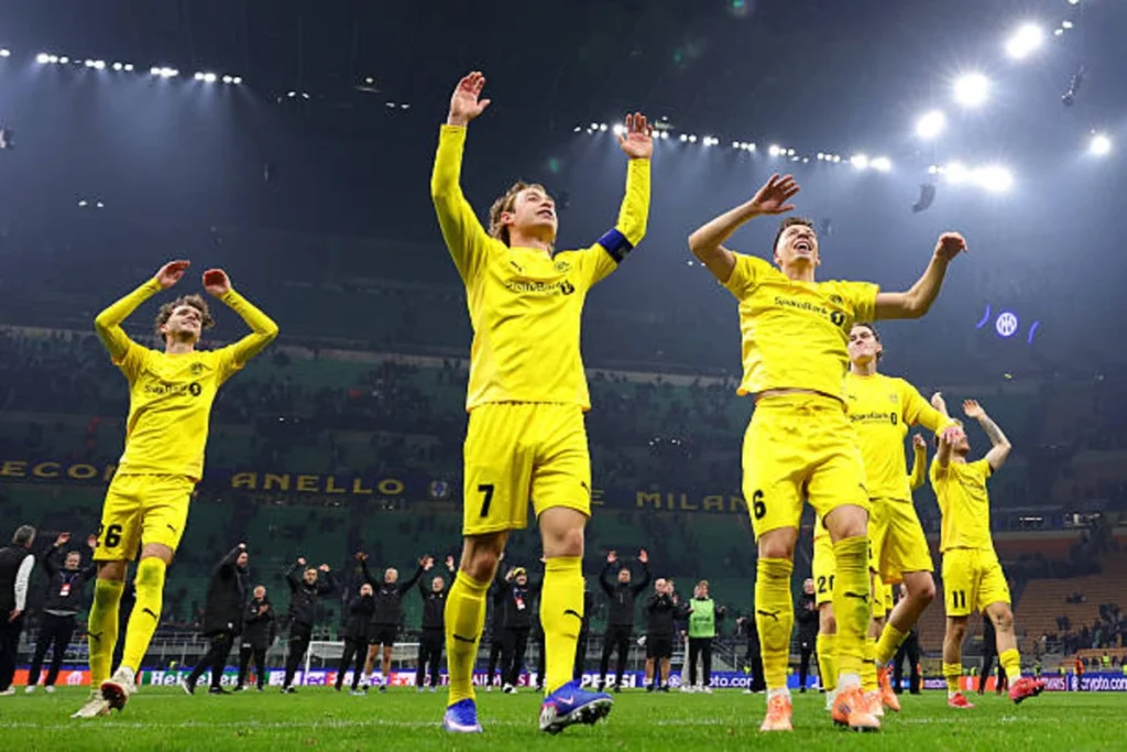 Bodo/Glimt players celebrate in front of the fans after beating Inter Milan to qualify for the Round of 16 of the Champions League