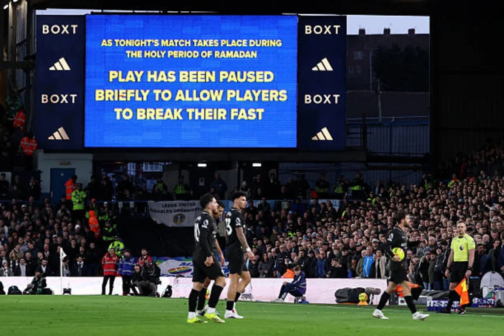 General view as the screen in the ground announces a break in play to allow players to break their fast for Ramadan during the Premier League match between Leeds United and Manchester City at Elland Road