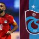 Split image featuring Mohamed Salah and the badge of Trabzonspor.